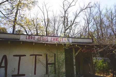 Abandoned Home with Religious Messages